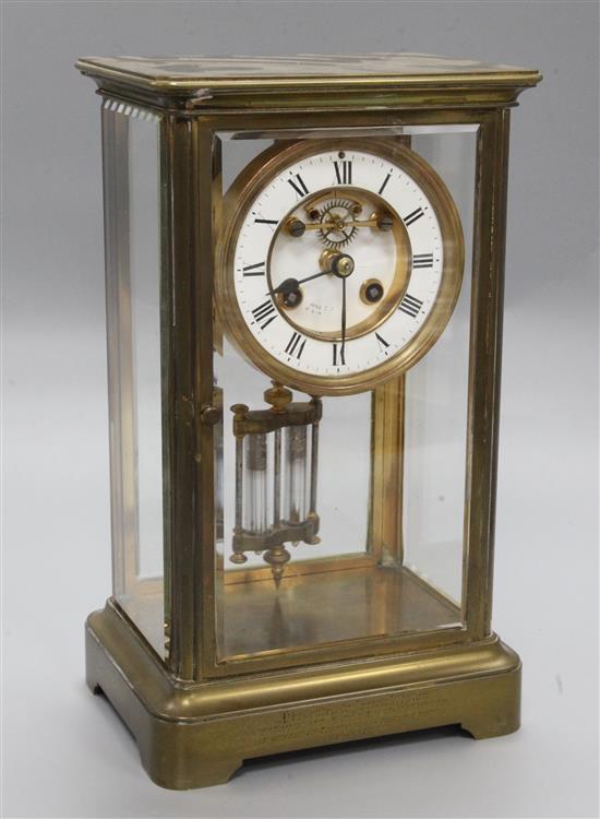 A Victorian brass four glass mantel clock, height 30cm